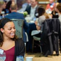 Lynn "Chick" Blue chatting with a student at Scholarship Dinner 2019
